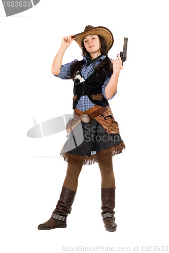 Image of Young cowgirl with a gun