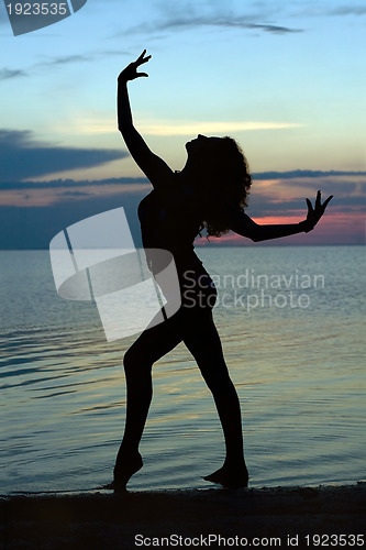 Image of Silhouette of a young woman