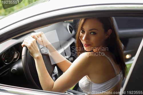 Image of Young woman in lingerie