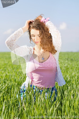 Image of Portrait of charming young woman