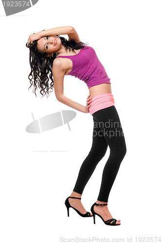 Image of Joyful young brunette in a black leggings