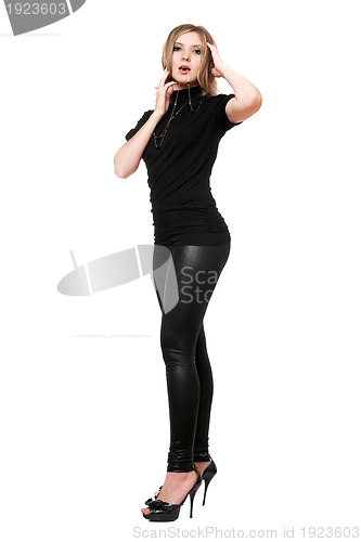 Image of Beautiful young woman in leggings. Isolated