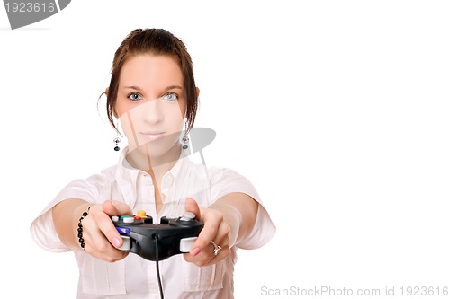 Image of Young brunette girl with a joystick