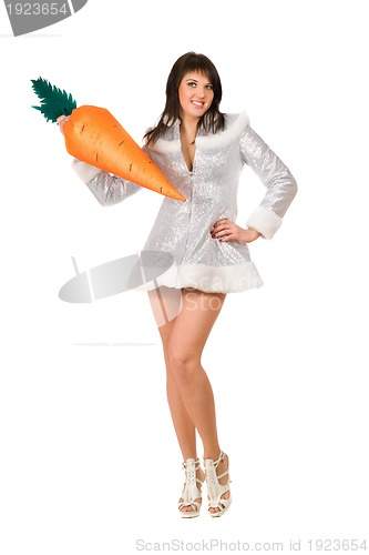 Image of young brunette with a carrot