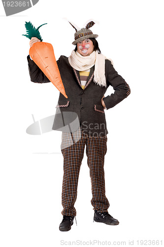 Image of Young man with carrot