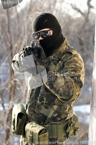 Image of Portrait of soldier with a handgun