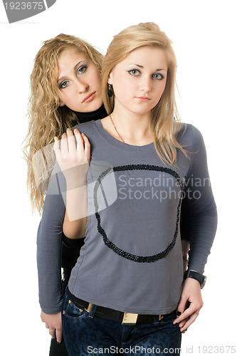 Image of Portrait of two pretty young women. Isolated