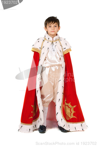 Image of boy dressed in a robe of King