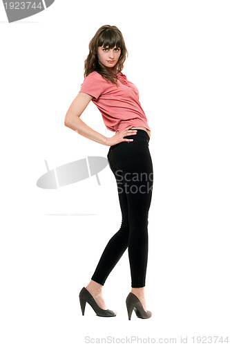Image of Young pretty woman in a black leggings. Isolated 