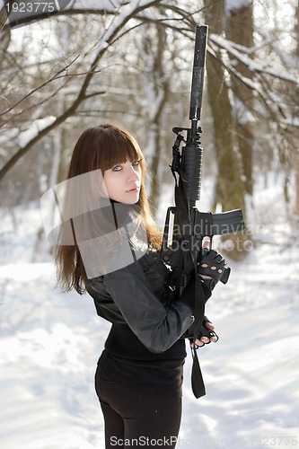Image of Turned lady with the gun