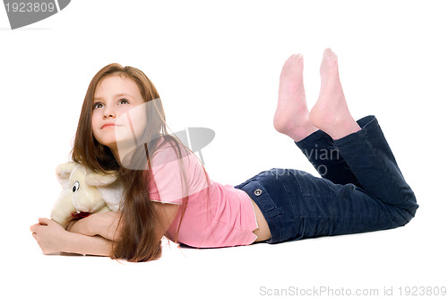 Image of Little girl with a teddy elephant