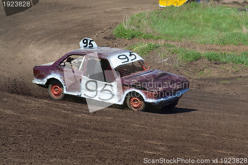 Image of Race for survival. White purple car