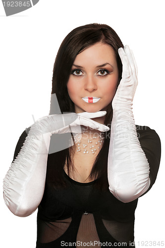 Image of Pretty young brunette gesturing. Isolated