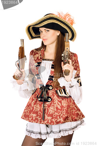 Image of charming woman with guns dressed as pirates