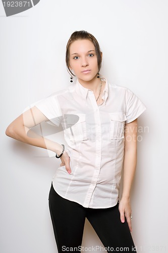 Image of Young sexy lady in white chemise