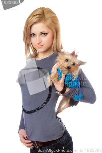Image of Pretty blonde posing with puppy. Isolated