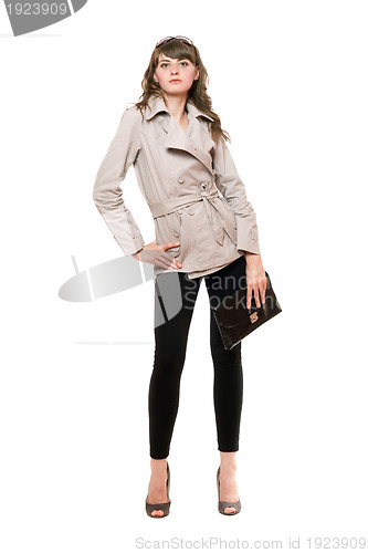 Image of Nice girl wearing a coat and black leggings