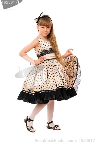 Image of Lovely little girl in a dress