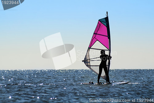 Image of Silhouette of a girl windsurfer