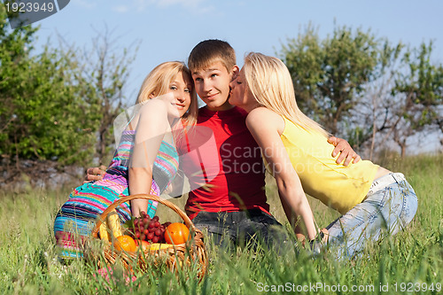 Image of Two playful blonde and young man
