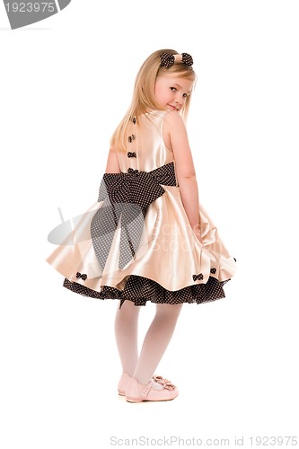 Image of Lovely little lady in a dress. Isolated