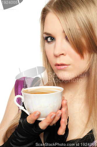 Image of Attractive young blonde with a cup of tea
