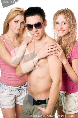 Image of Two attractive blonde women with young man
