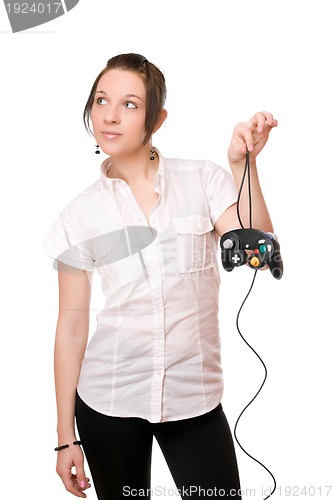 Image of Beautiful brunette girl with a joystick