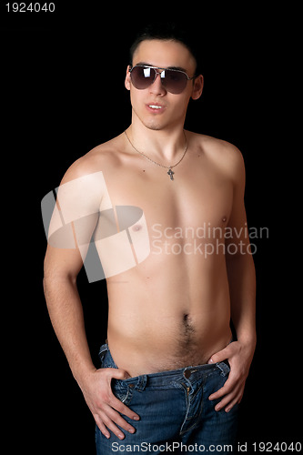 Image of Portrait of handsome young man in sunglasses