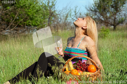 Image of Pretty blonde with wineglass