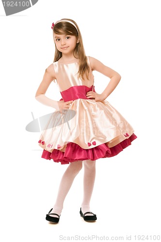 Image of Playful little lady in a dress