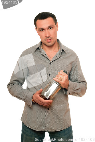 Image of Man with a bottle of whiskey. Isolated