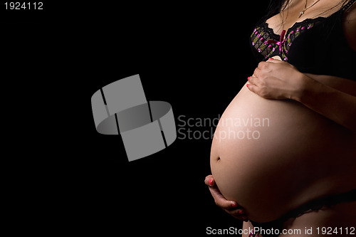 Image of Belly of a pregnant young woman
