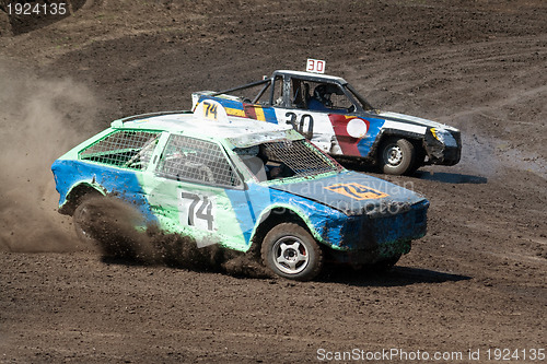 Image of Race for survival. Two cars