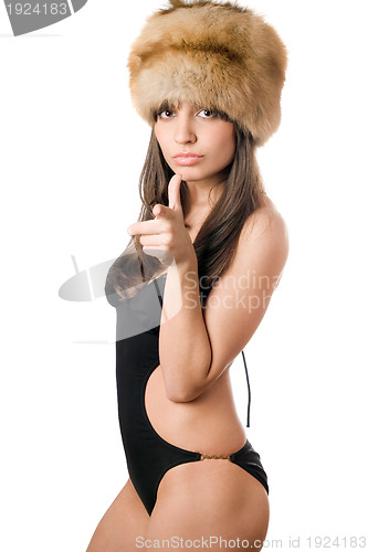 Image of caucasian woman in swimsuit and fur-cap