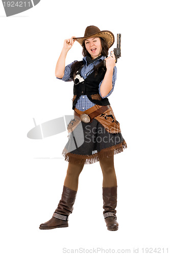 Image of Cheerful cowgirl with a gun