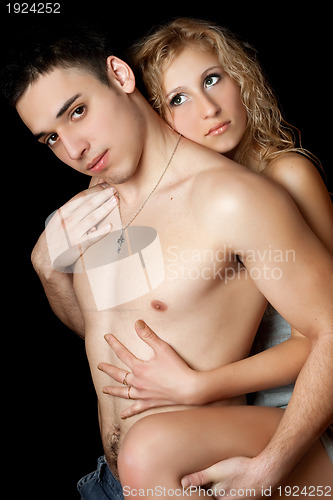 Image of Portrait of attractive loving young couple. Isolated