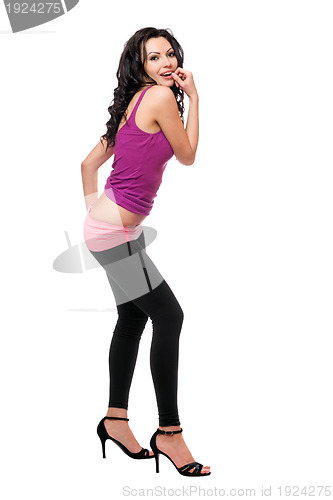 Image of Cheerful young brunette in a black leggings