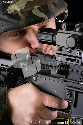 Image of Soldier looking in the sight