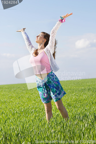 Image of Happy nice young woman