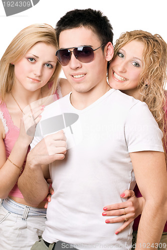 Image of Portrait of a two smiling blonde women with young man