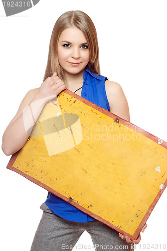 Image of Young woman posing with yellow vintage board