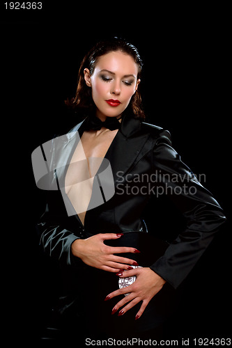 Image of Attractive brunette wearing a black suit
