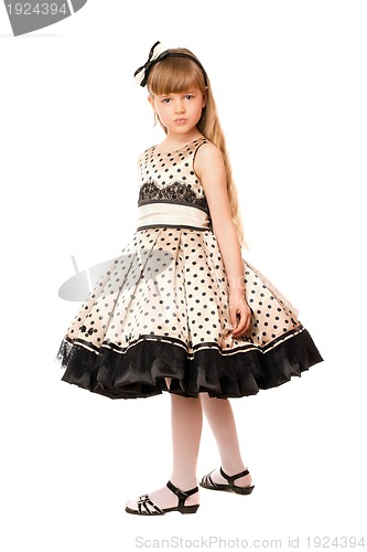 Image of Charming little girl in a dress