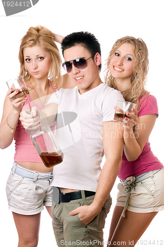 Image of Cheerful young people with a bottle of whiskey