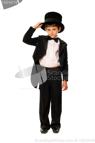 Image of Little boy in a tuxedo and hat