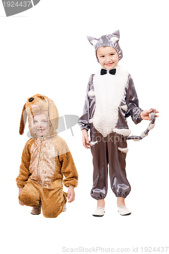 Image of Playful boys dressed as a cat and dog