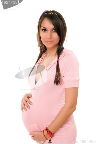 Image of Beautiful pregnant brunette woman