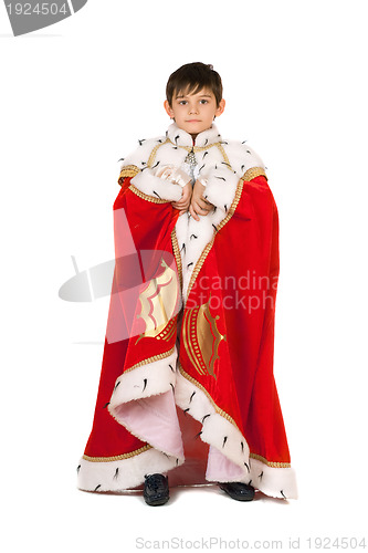 Image of Boy dressed in a robe of King. Isolated