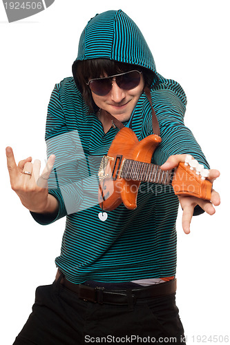 Image of man in sunglasses with a little guitar